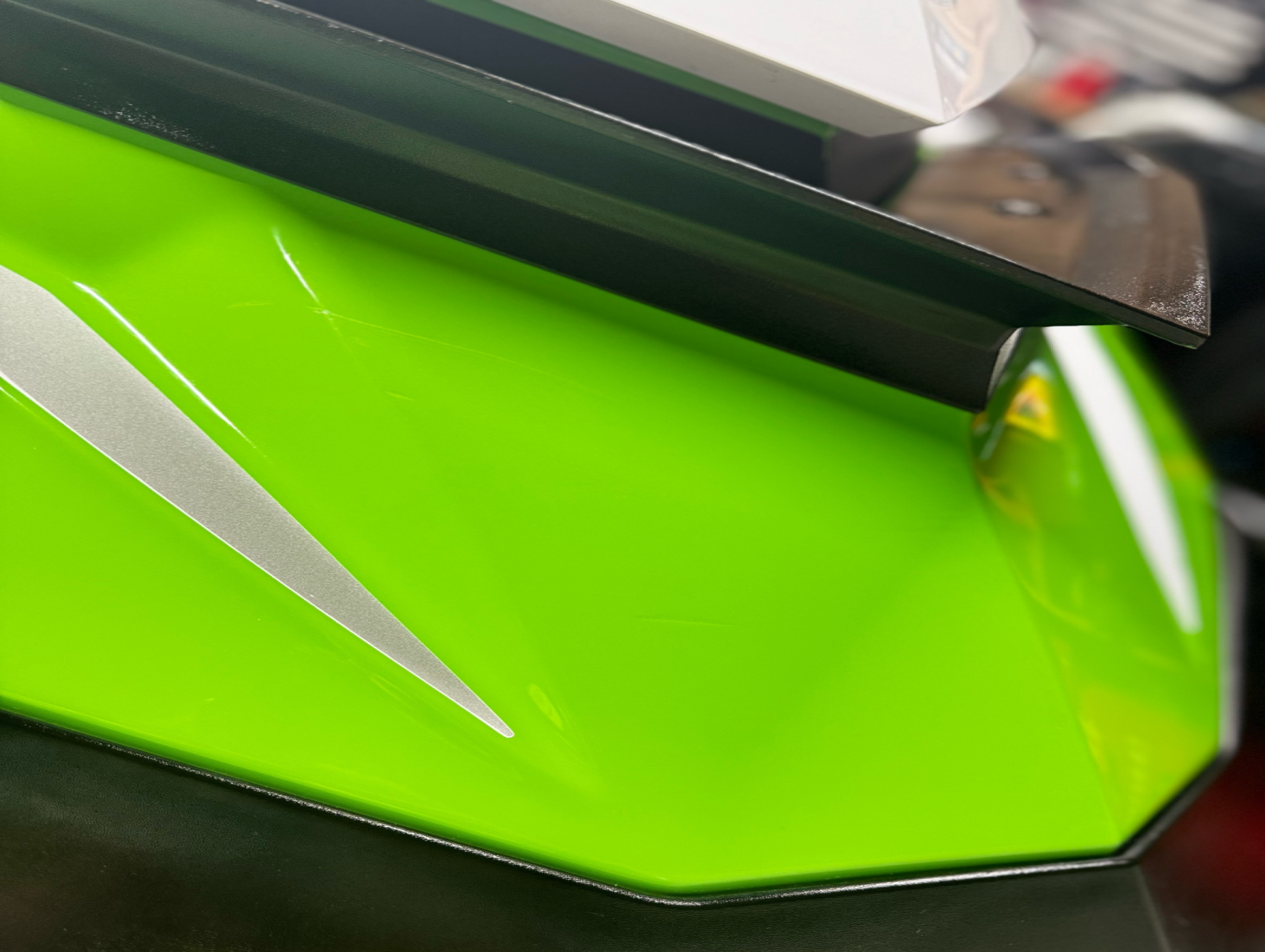 jet ski tail with dents removed and shiny surfaces